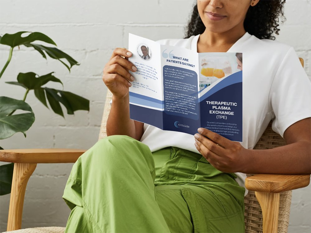 woman reading TPE brochure