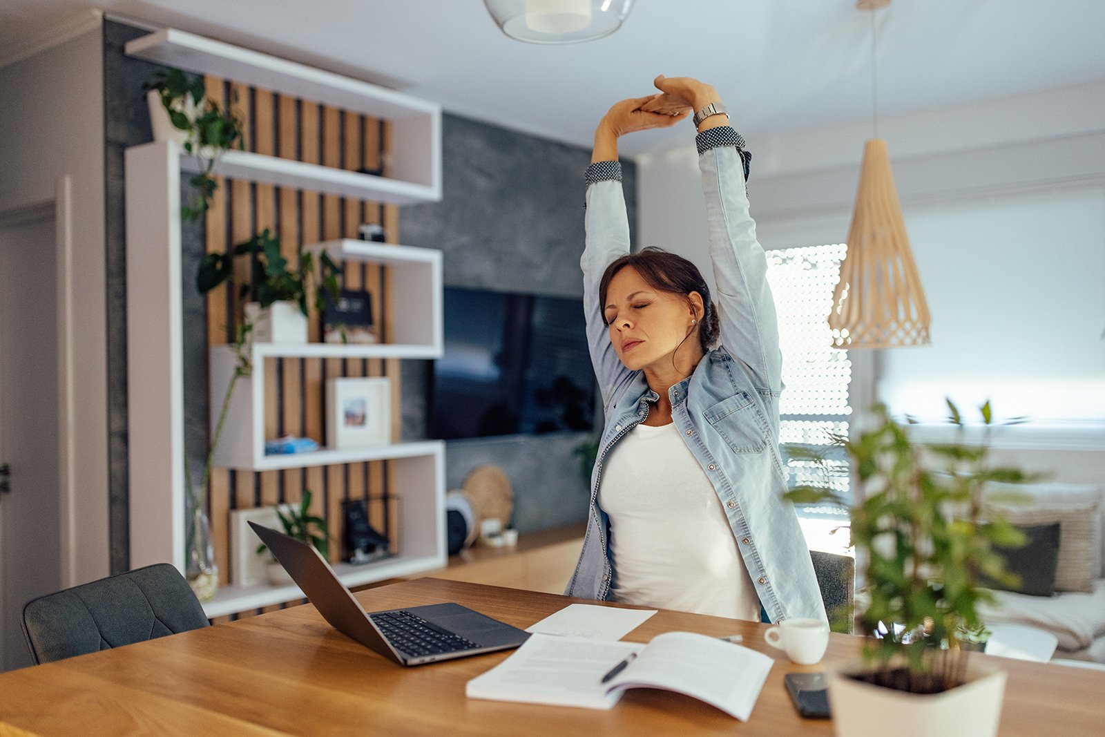 tired woman with MCAS stretching